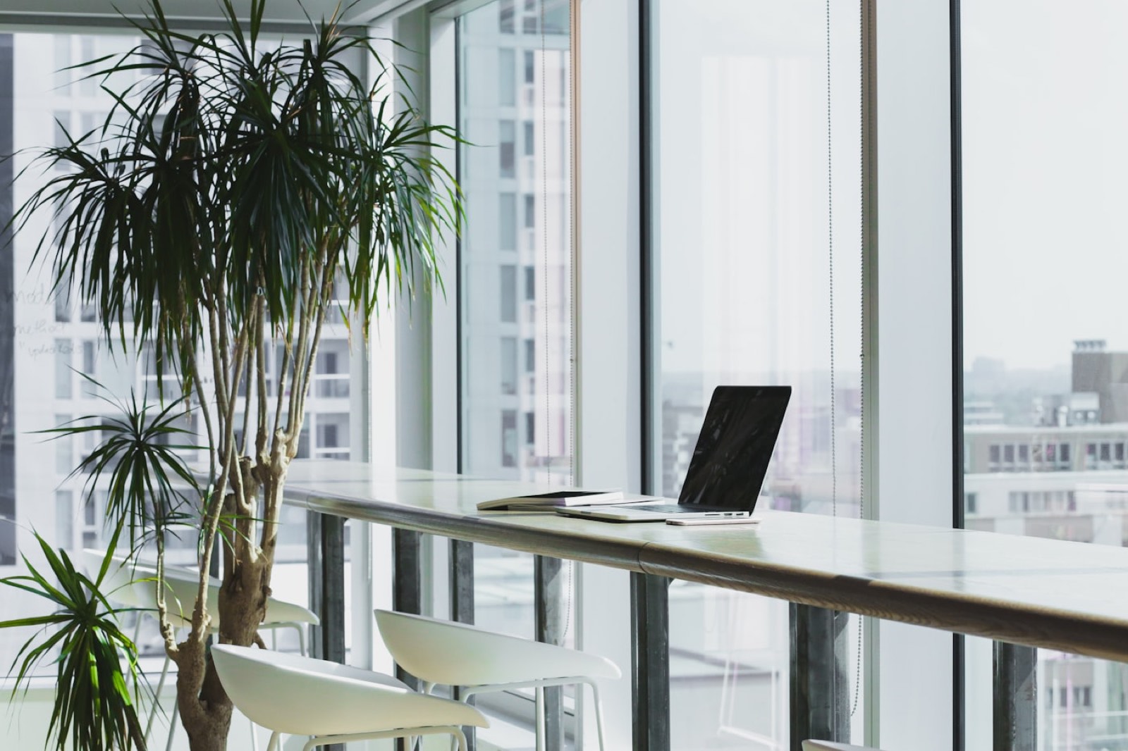 Rows of desks in a modern office.